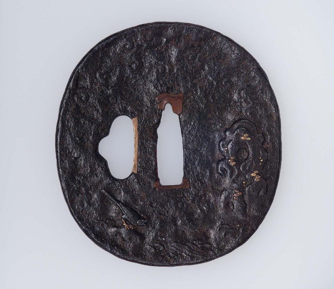 Tsuba with design of bird, waves and rocks