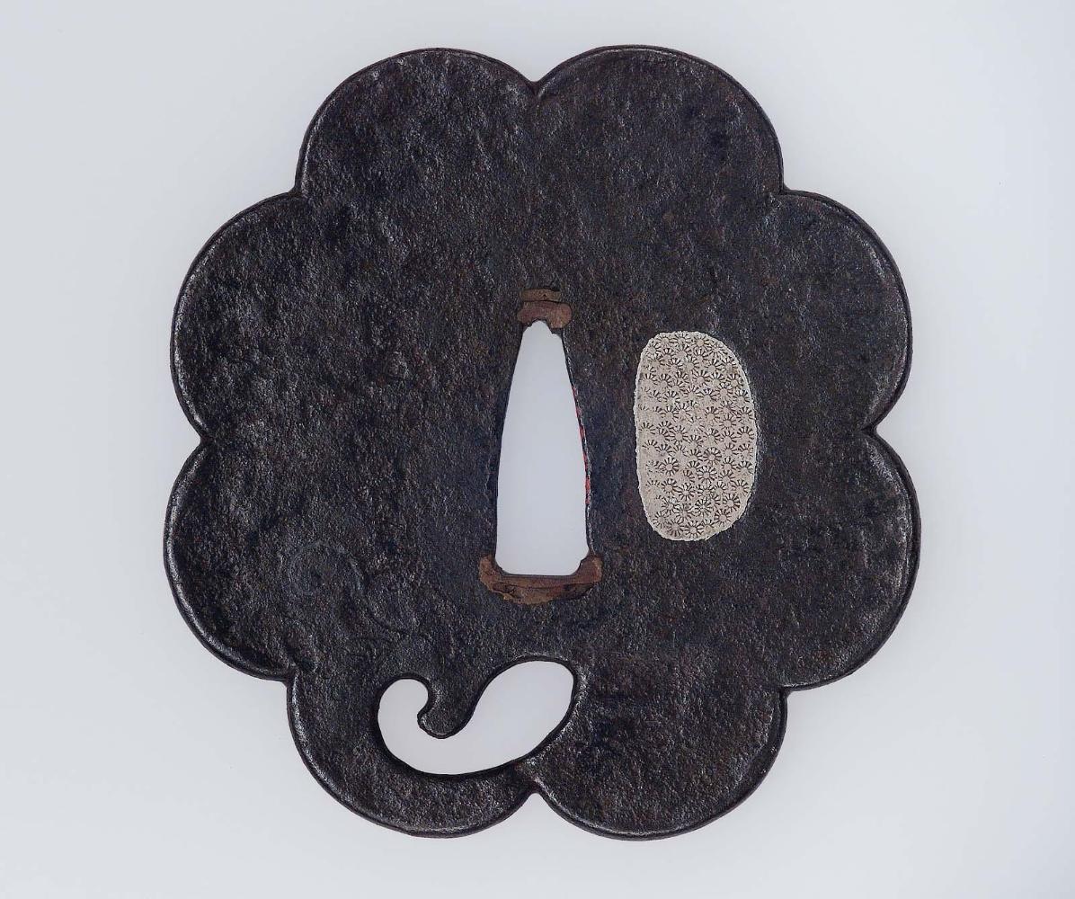 Tsuba with design of leaves and clouds