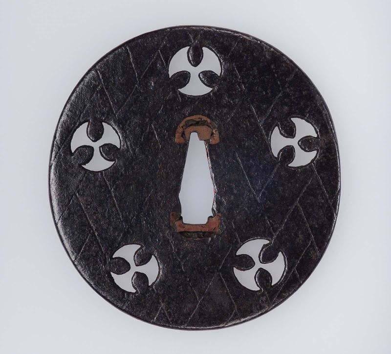 Tsuba with woven pattern and mon piercings