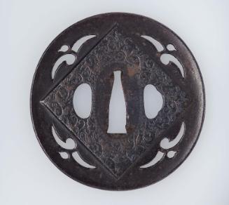 Tsuba with design of gulls, with a raised panel of floral decoration
