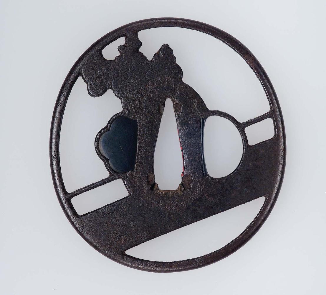 Tsuba with design of paulownia crest and bridge