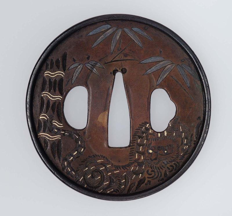 Tsuba with design of tiger and bamboo