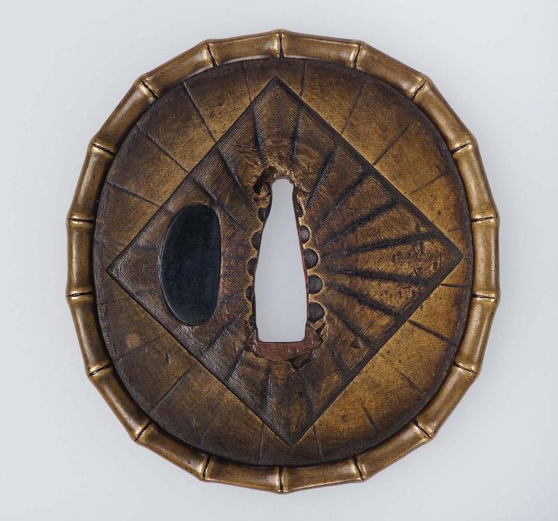 Tsuba with radiating lines and bamboo rim