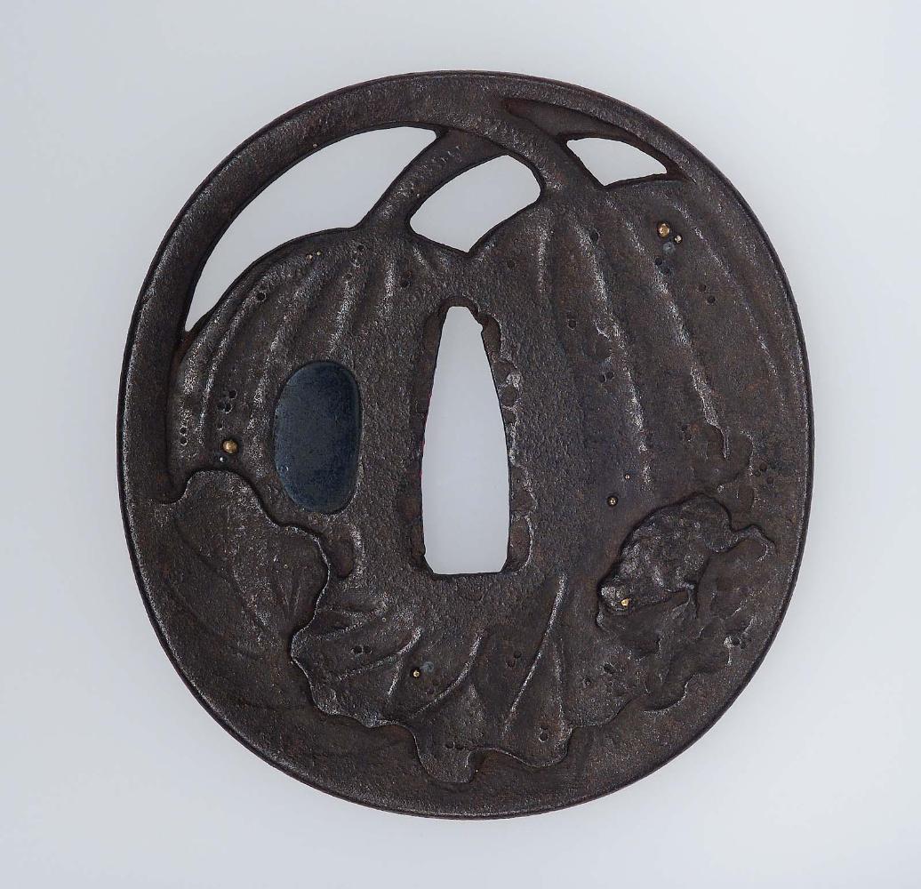 Tsuba with design of frog and lotus leaf