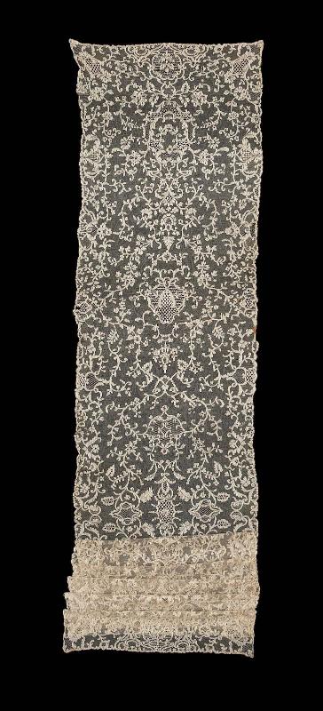 A long rectangular bobbin lace shawl