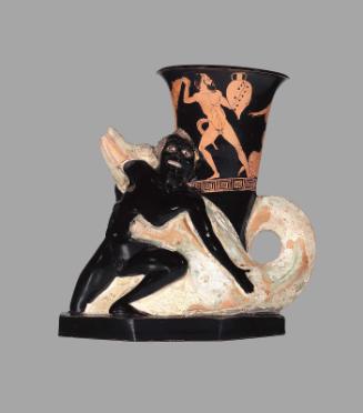 Drinking horn (rhyton) in the form of a crocodile devouring an African youth