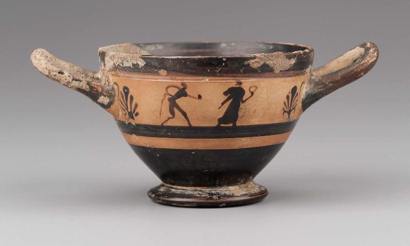 Drinking cup (skyphos) with a maenad pursued by satyr