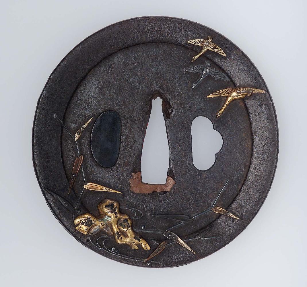 Tsuba with design of geese, reeds, rocks and stream