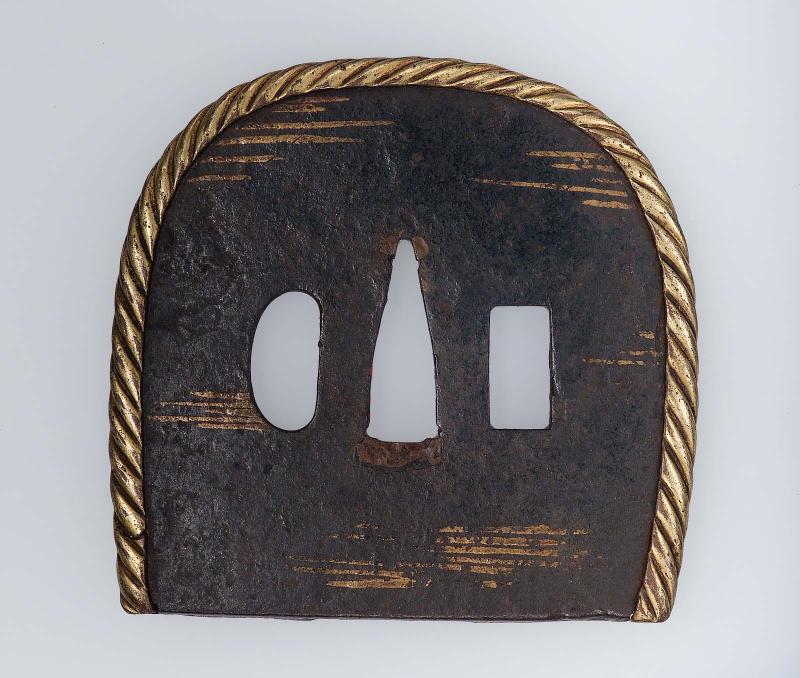 Tsuba with applied rim and repair to one side
