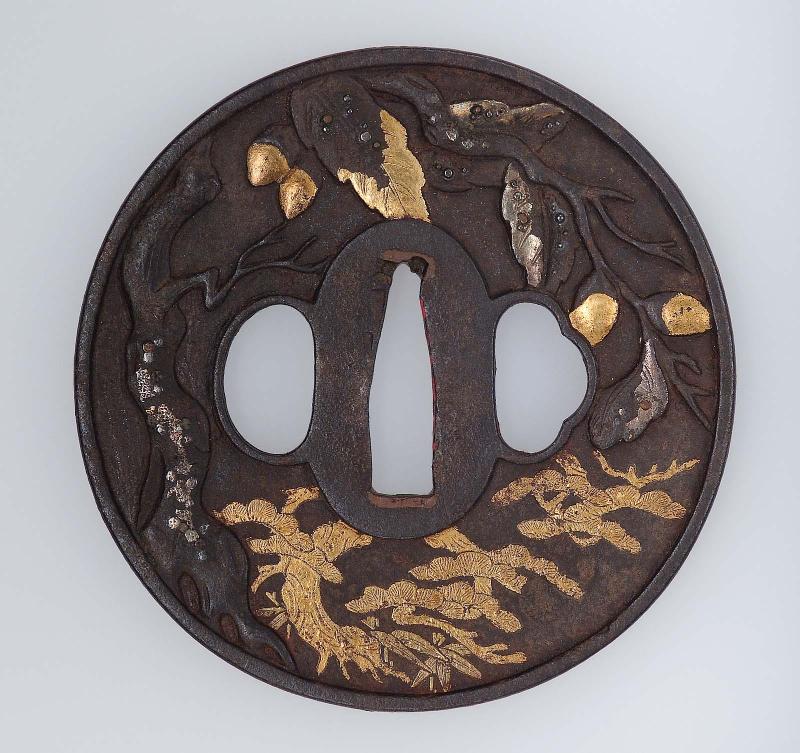 Tsuba with design of pine and magnolia