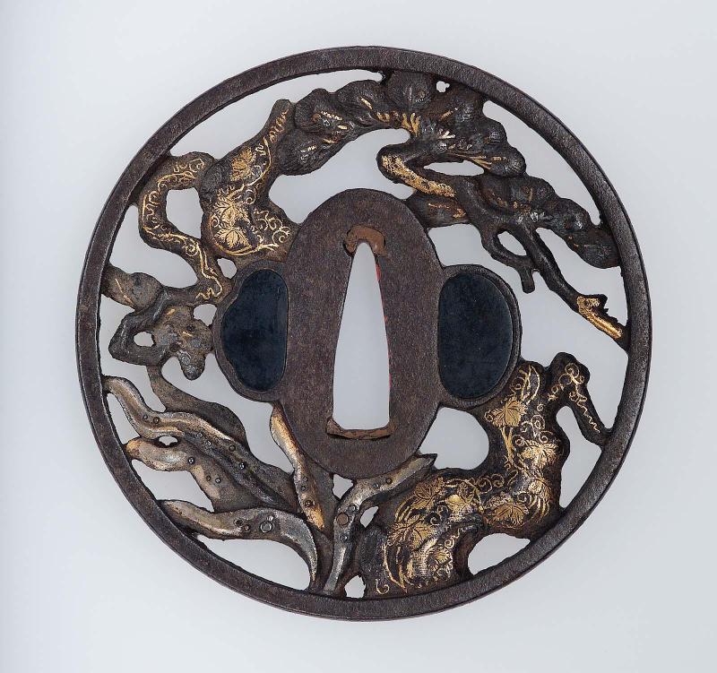 Tsuba with design of pine tree and creeper