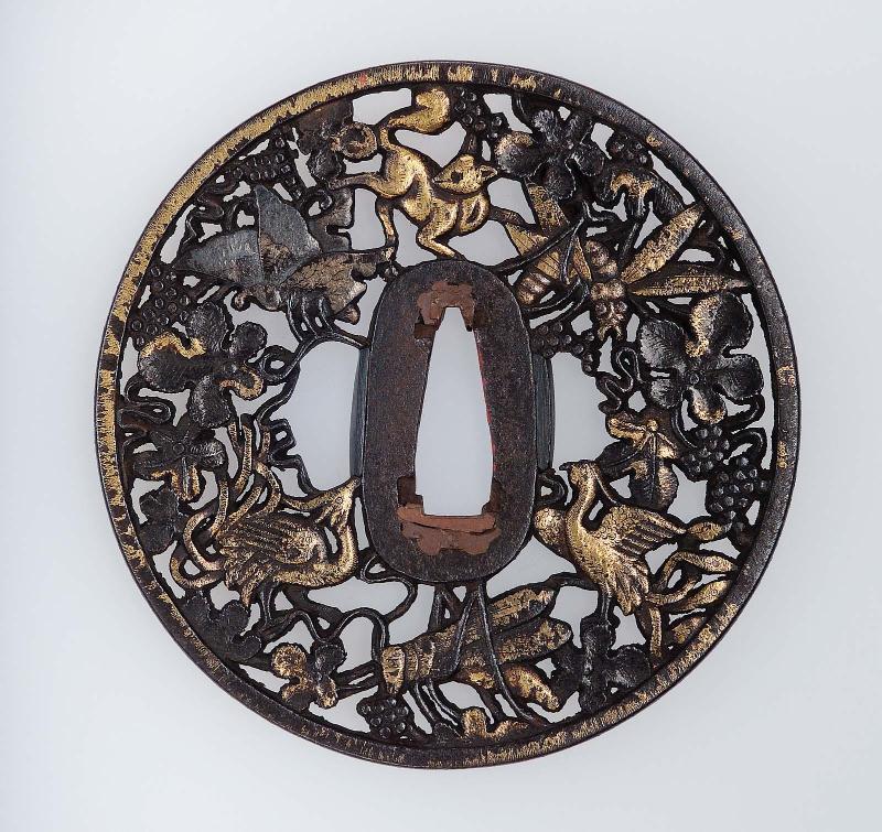Tsuba with design of squirrel, insects, ho-o birds and vine