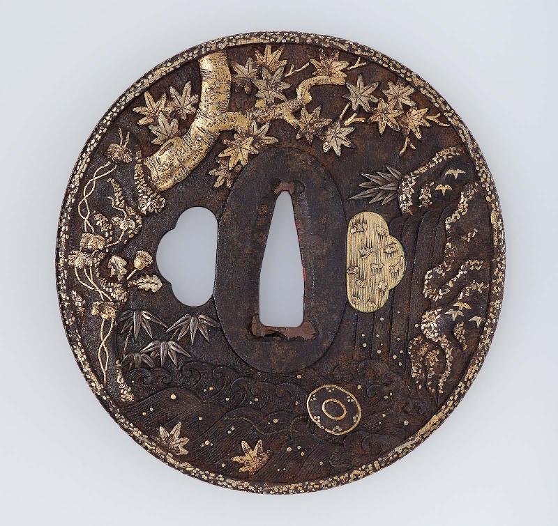 Tsuba with design of maple, rocks and waves