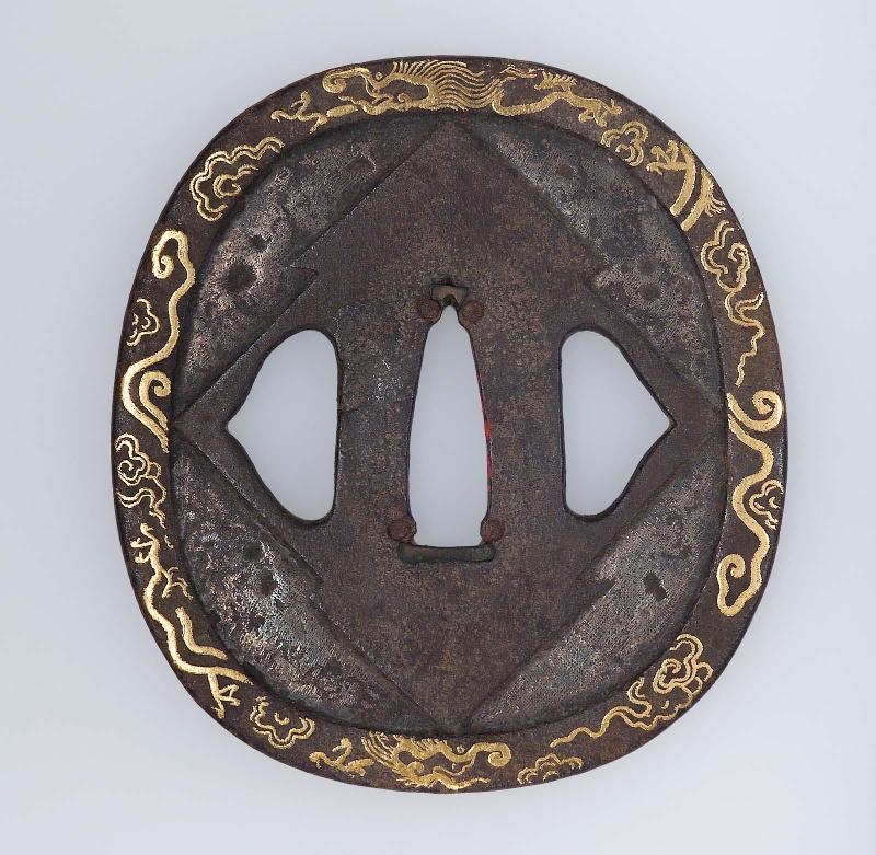 Tsuba with design of dragons and clouds around rim