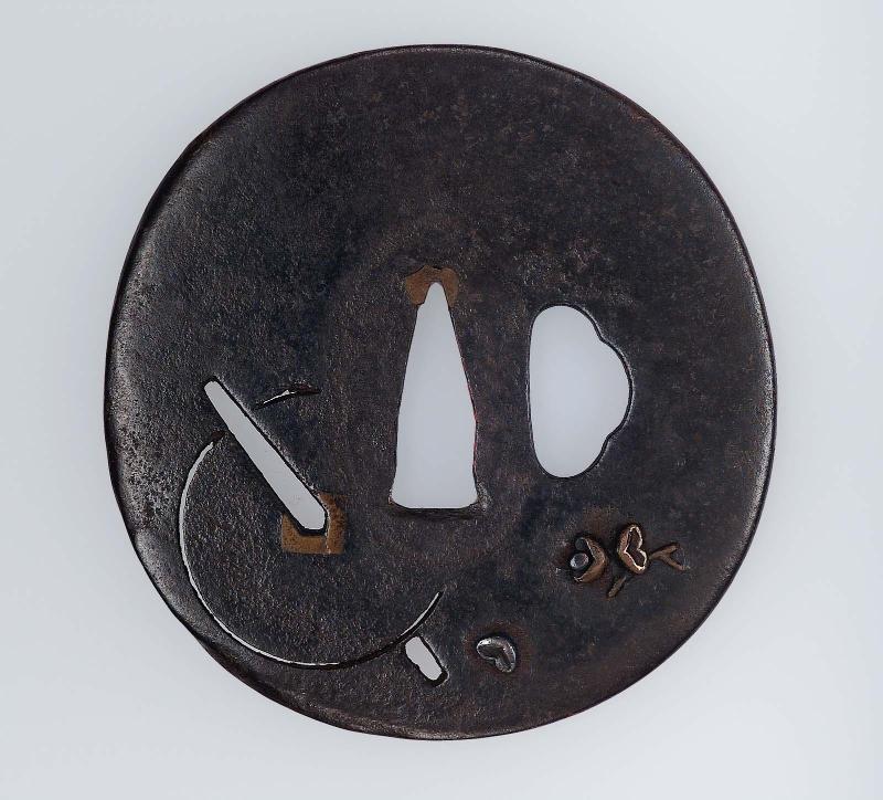 Tsuba with design of spinning top and camellia