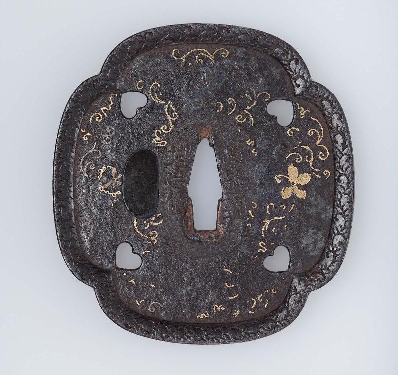 Tsuba with design of blossoms, fruit, leaves and tendrils