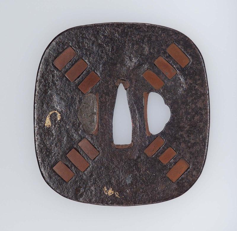 Tsuba with filled pierced design