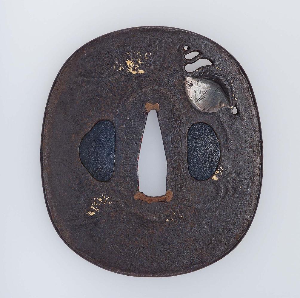 Tsuba with design of shell, waves and stylized blossoms