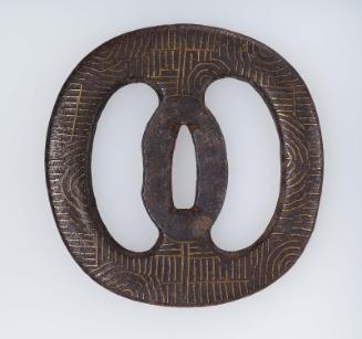 Tsuba with two large namazu piercings and linear designs