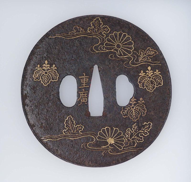 Tsuba with design of paulownia and chrysanthemum crests and a stream