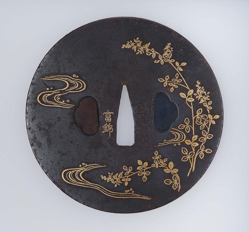 Tsuba with design of hagi and stream