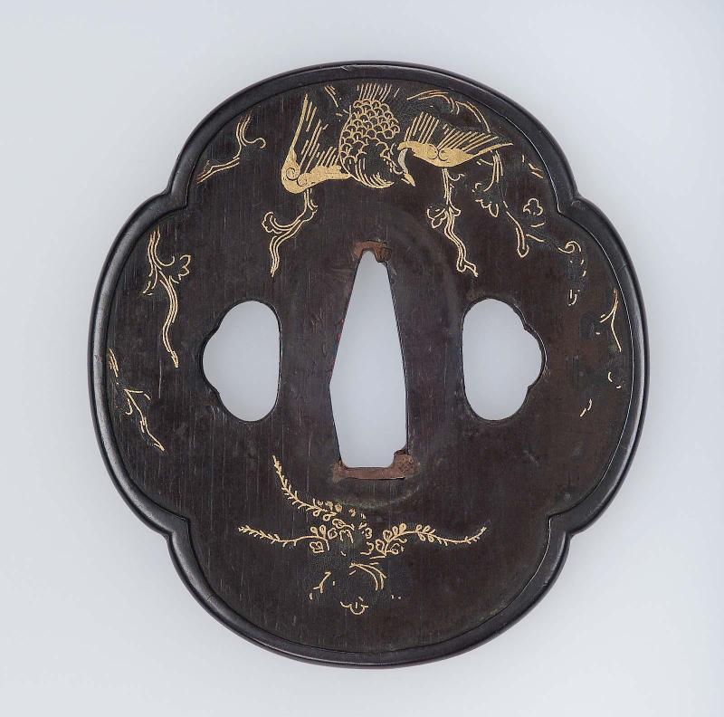 Tsuba with design of ho-o bird, paulownia and stylized lightning