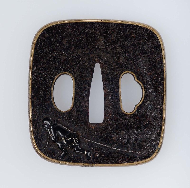 Tsuba with design of Koronbo pulling a mushroom