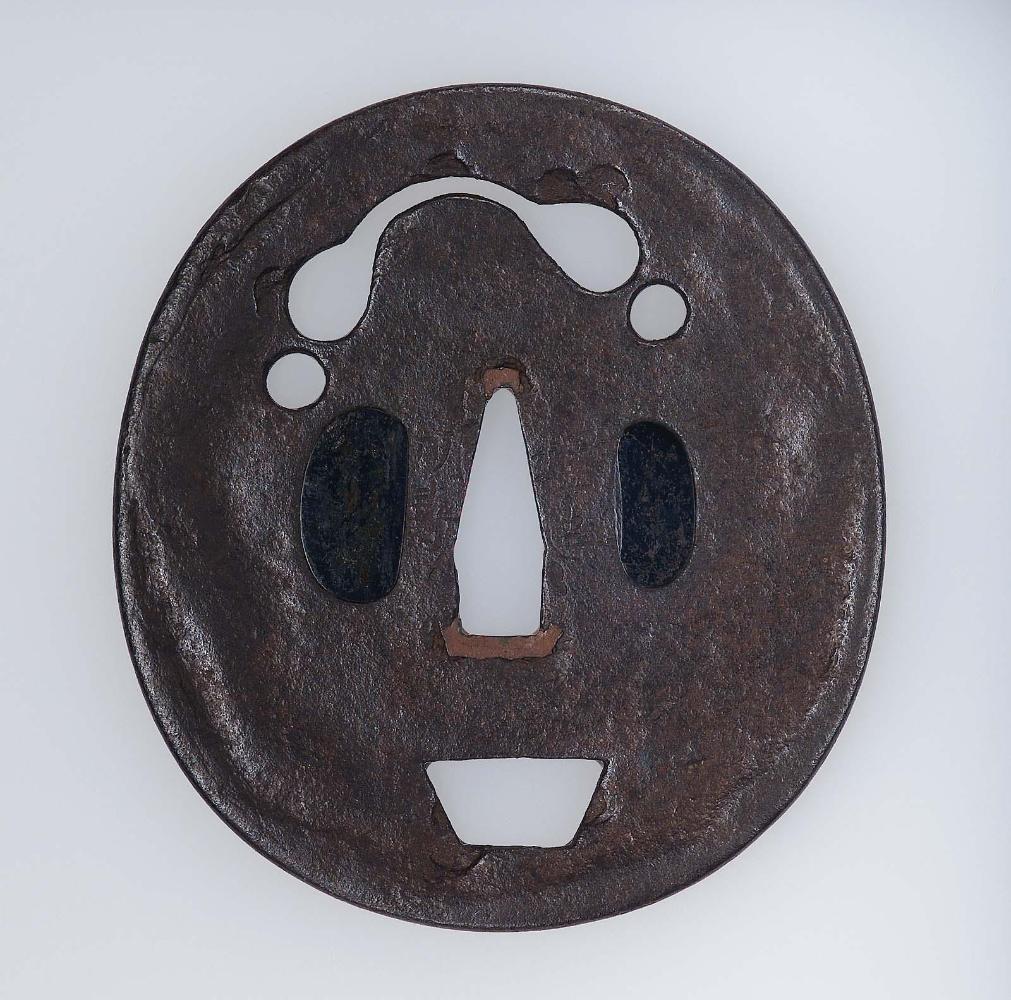 Tsuba with unidentified pierced designs