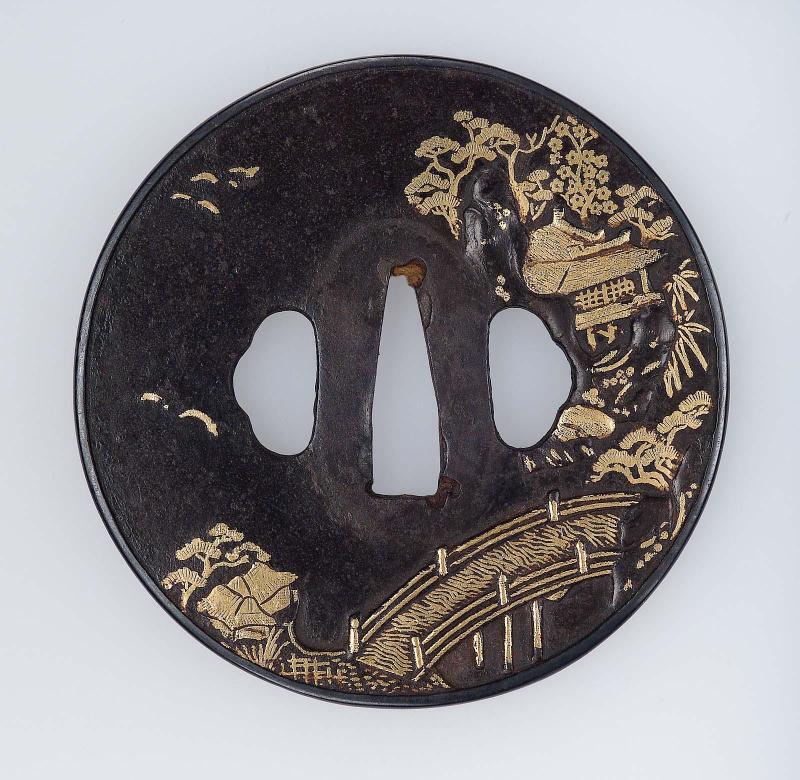 Tsuba with design of a pavilion, bridge, rustic dwellings and birds
