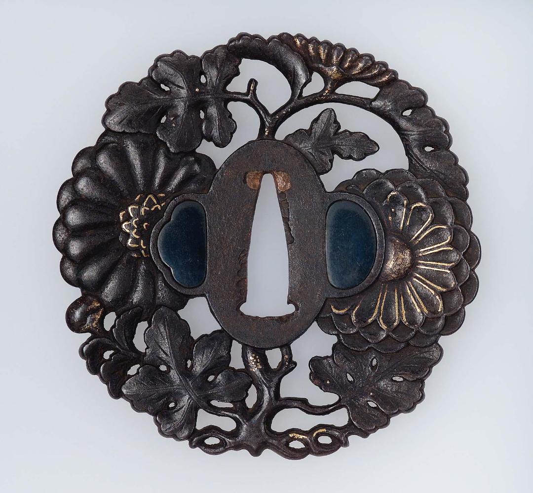 Tsuba in the form of a stem of chrysanthemums