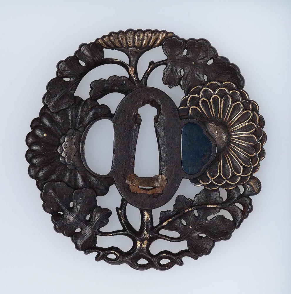 Tsuba in the form of a stem of chrysanthemums