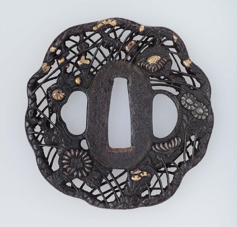 Tsuba with design of chrysanthemums and daisies