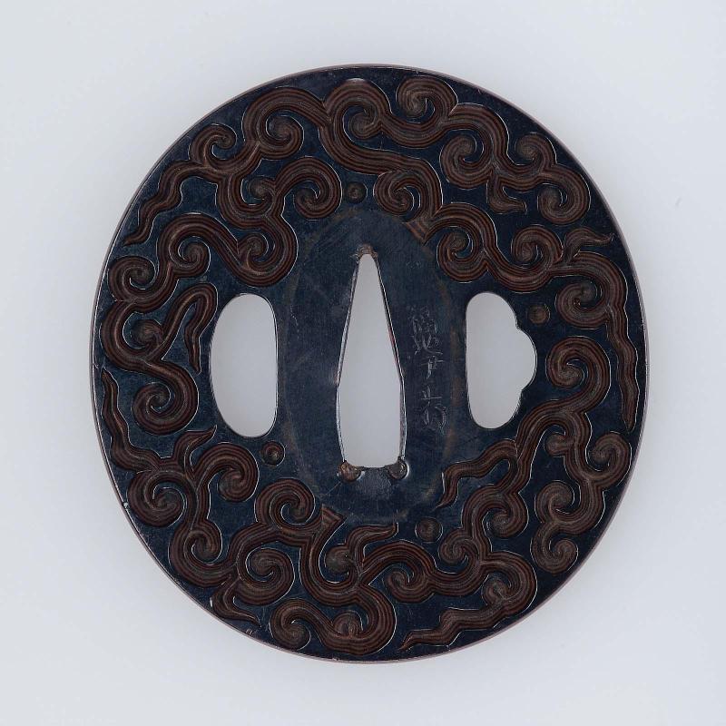 Tsuba with design of guri scrolls