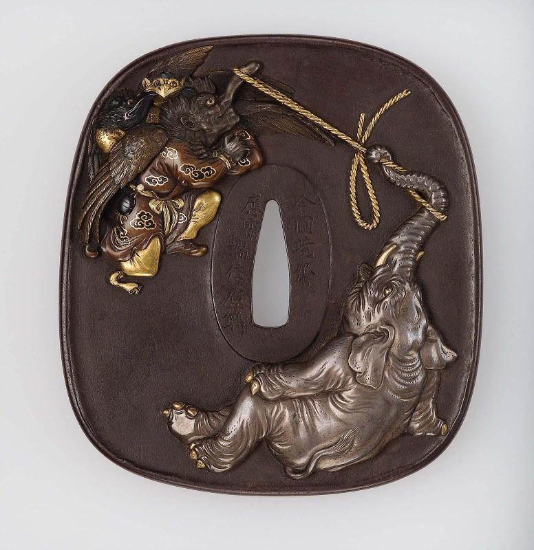 Tsuba with design of elephant and flying tengu