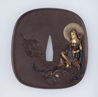 Tsuba with design of Monju Bosatsu on a lion