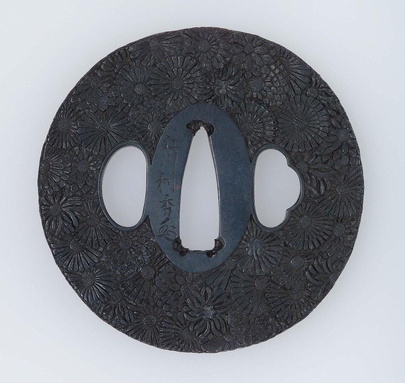 Tsuba with design of massed chrysanthemums