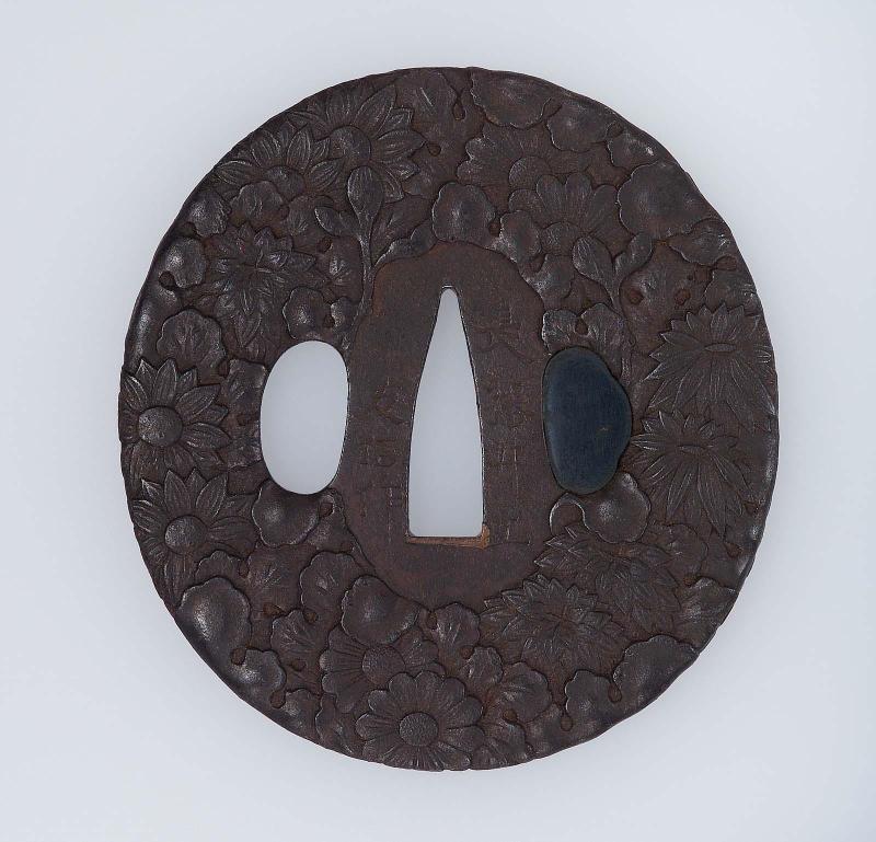 Tsuba with design of massed chrysanthemums