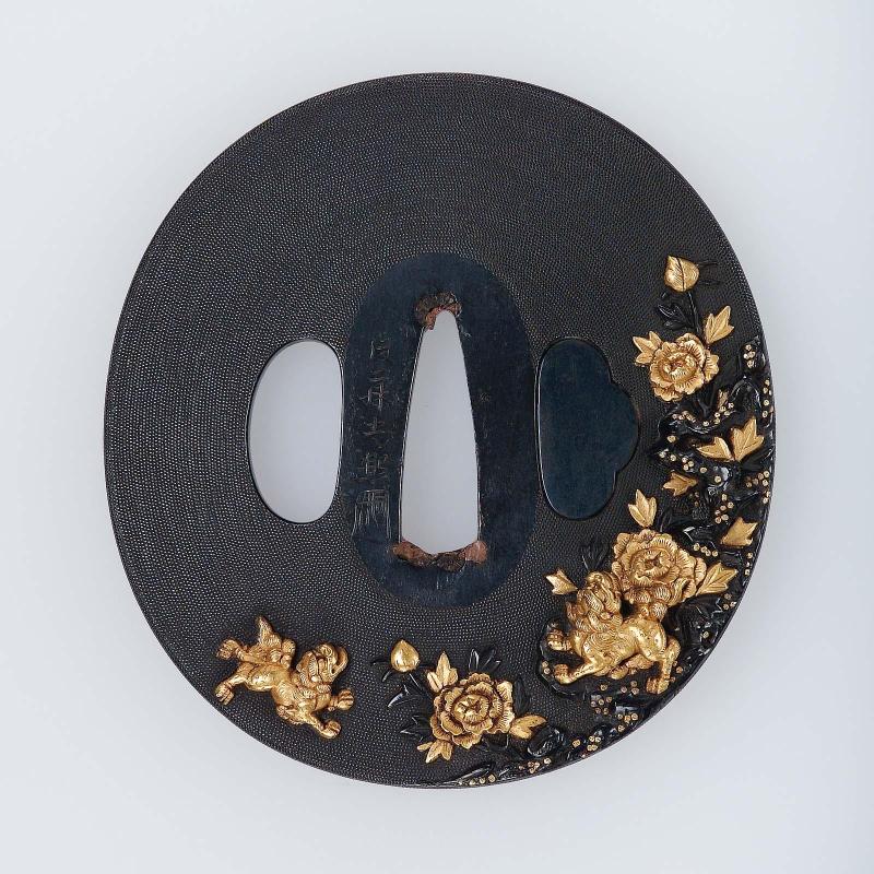 Tsuba with design of shishi and peonies
