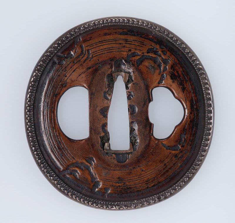 Tsuba with okina-yasuri (circular filemarks)