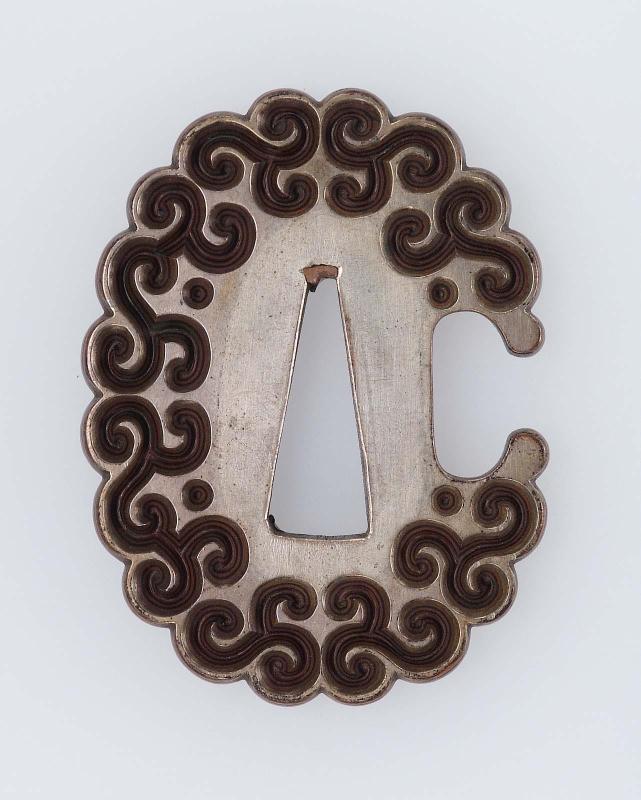 Tsuba with design of guri scrolls