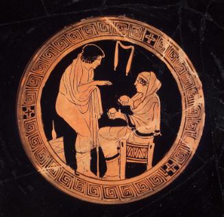 Drinking cup (kylix) with satyrs and maenads