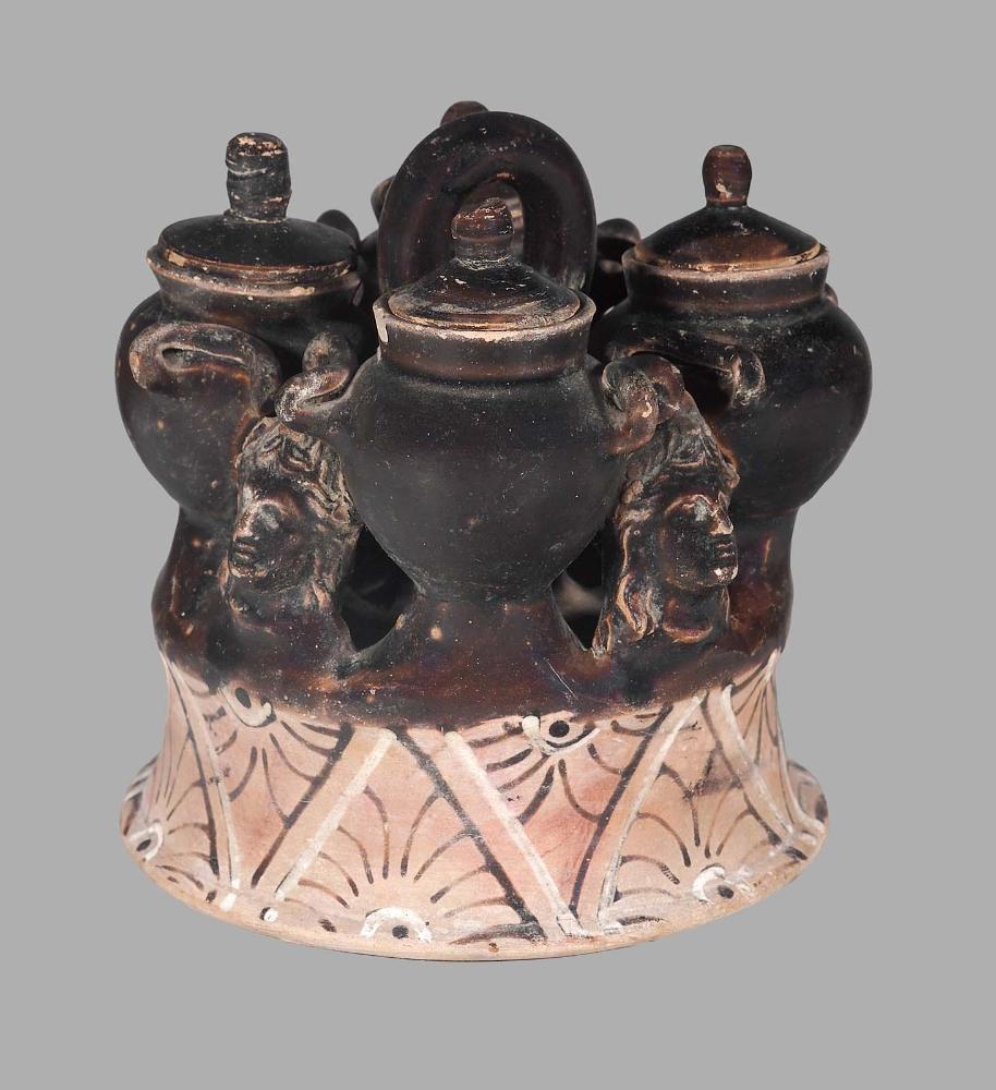 Quadruple vase ("Head-Cruet")