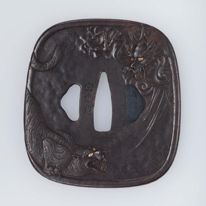 Tsuba with design of dragon and tiger