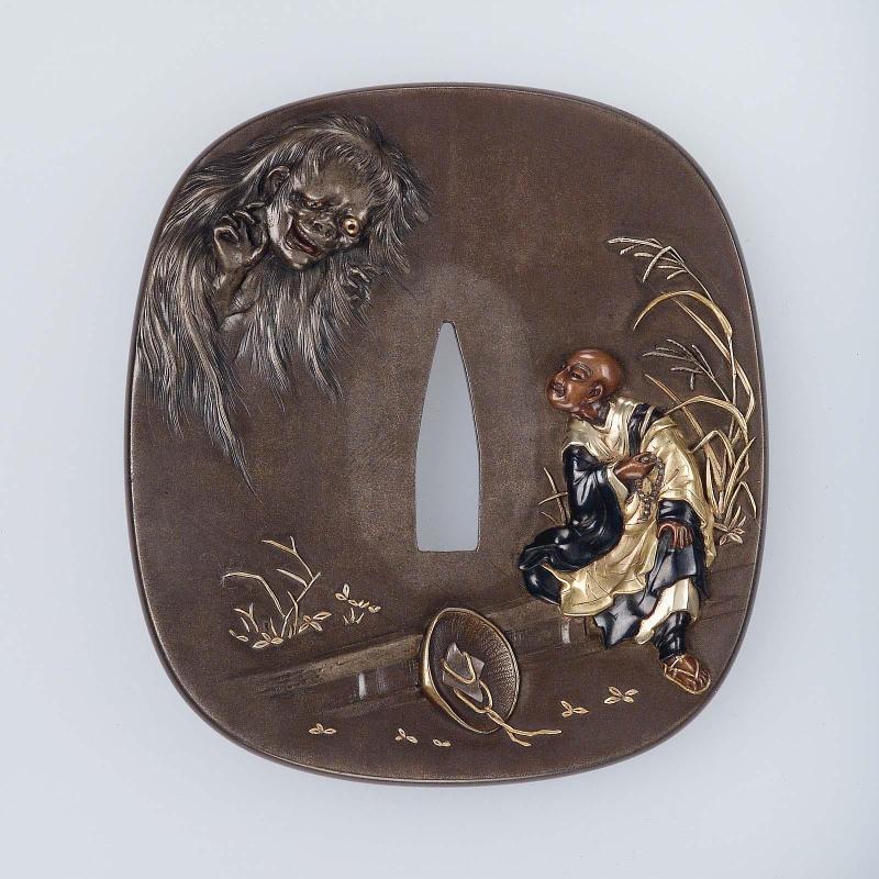 Tsuba with design of Buddhist monk haunted by a ghost
