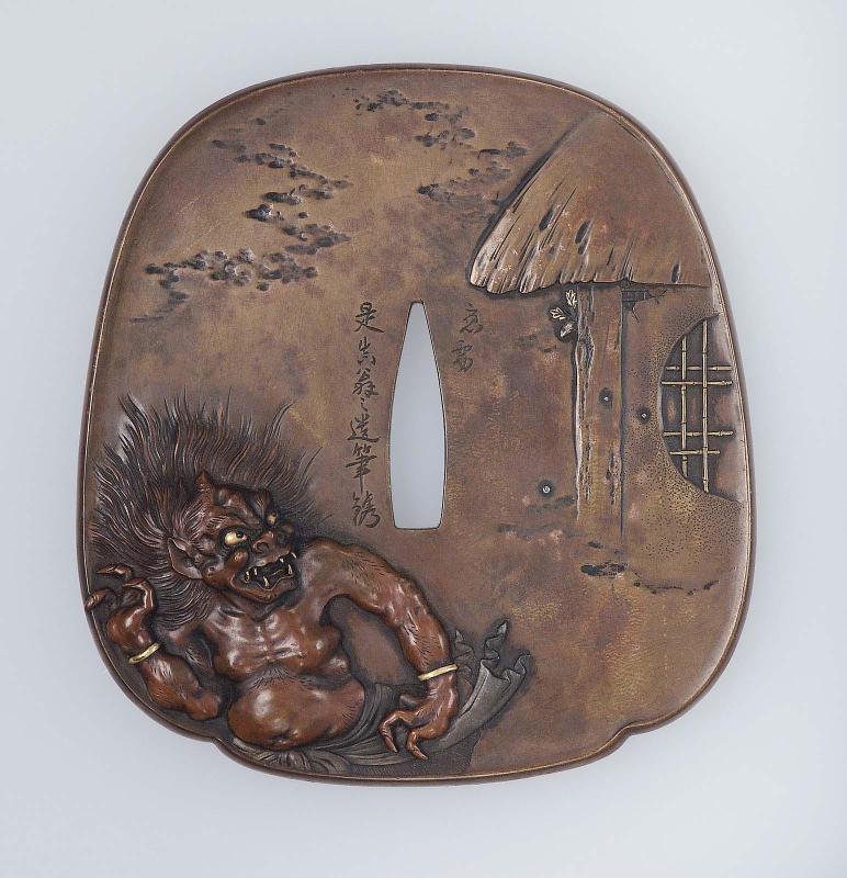 Tsuba with design of oni fleeing from beans at the New Year