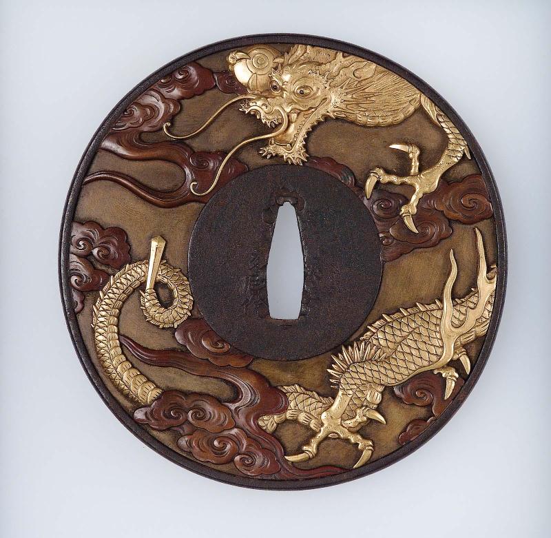 Tsuba with design of dragons and clouds