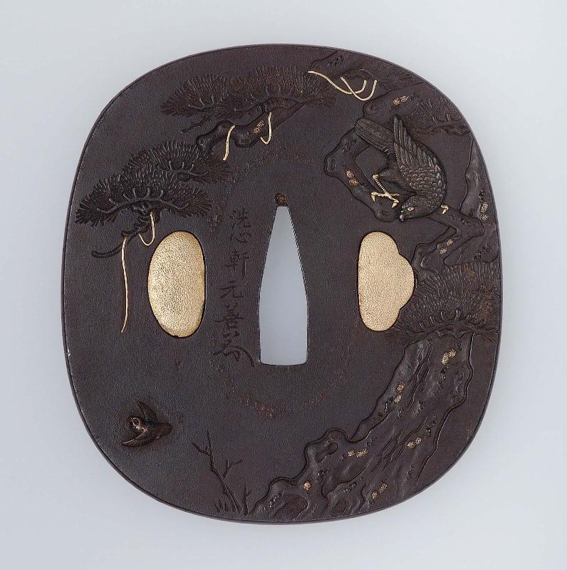 Tsuba with design of eagle in a pine tree watching a sparrow