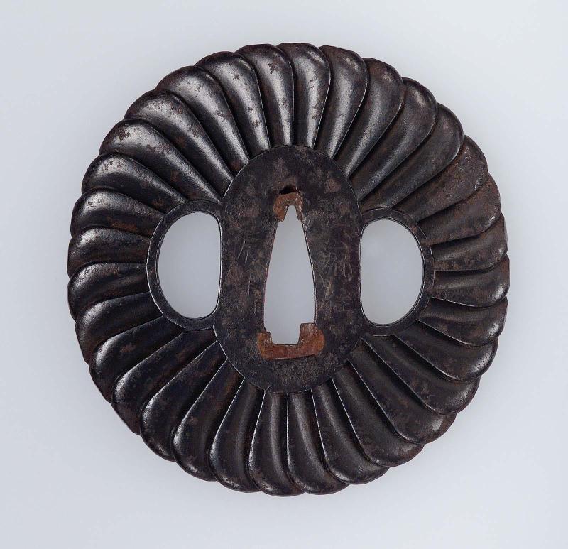 Tsuba with design of overlapping petals