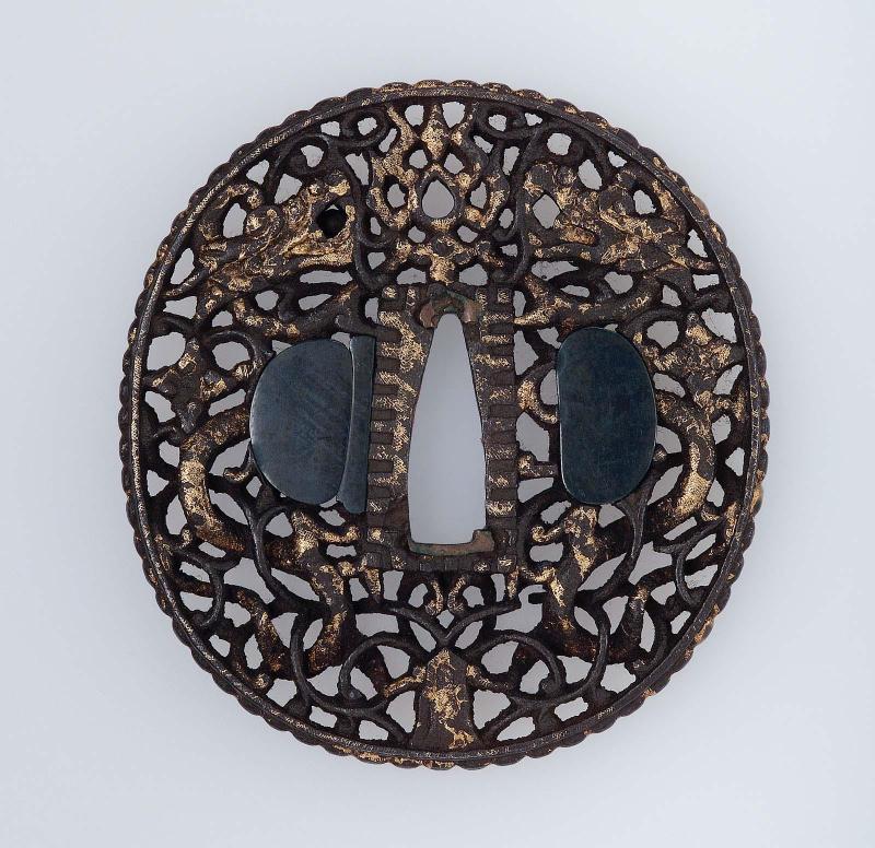Tsuba with design of confronted dragons and arabesques