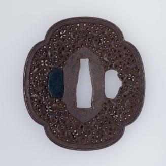 Tsuba with design of sea creatures (?) and arabesques